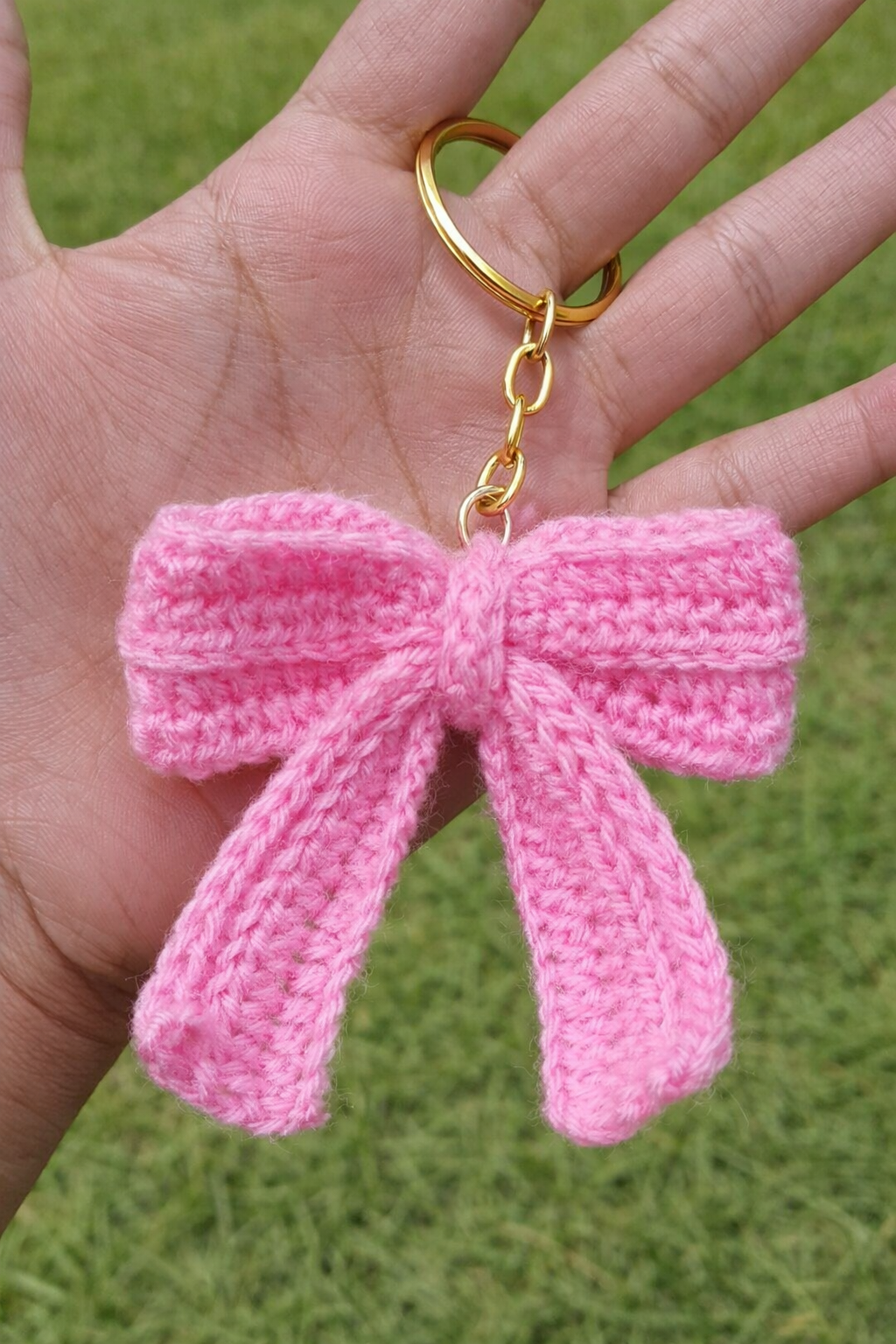 Handmade pink crochet bow keychain